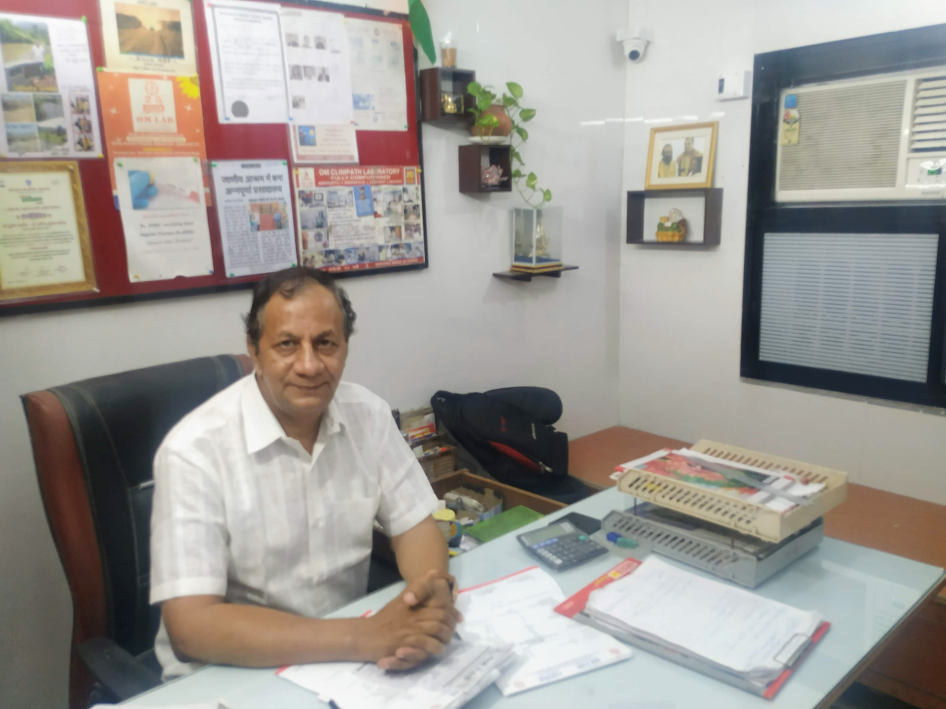 Dr. Suresh Patil At His Desk, Om Lab Ambernath